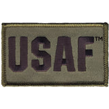 An embroidered rectangular patch with the letters USAF in dark olive drab on an olive drab background, finished with a stitched border.