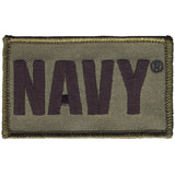 An embroidered rectangular tactical patch with the word 'NAVY' in dark charcoal lettering on an olive drab background, finished with a stitched border.