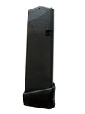 A black plastic magazine or grip component shown vertically against a plain light gray background.