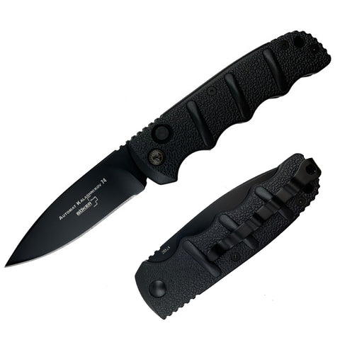 A Böker Plus Kalashnikov automatic pocket knife with a black aluminum handle and black D2 steel blade, accompanied by a black sheath.