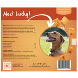 Back packaging of Shop Lucky and Friends 'Meet Lucky!' pet treats, featuring a dog photo, ingredients, feeding guidelines, and a barcode on an orange and tan background.
