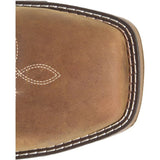 Close-up of a brown leather product with white stitching on a white background
