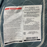 Label on a fire-resistant garment with text and warning signs.