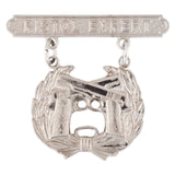 Silver badge with 'Pistol Expert' text and gun design on a white background