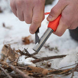 Person using a tool to cut through snow and branches