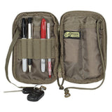 Open tactical pouch with tools and keys on a white background