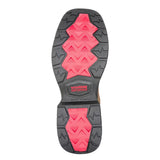 The outsole of a Wolverine work boot, featuring a black treaded rubber base with two bright pink textured grip zones and a red and black Wolverine logo in the center.