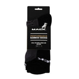 Black sock with packaging displaying 'Mack' brand on a white background