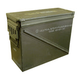 A green ammo can with a rubber seal in the lid and a label with information about the product.